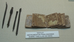 Roman clay tablets (to hold wet clay) and scribes - source Museo Arqueologico, Seville