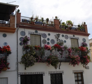 House with terracotta tiles and plaques, Grenada, Spain