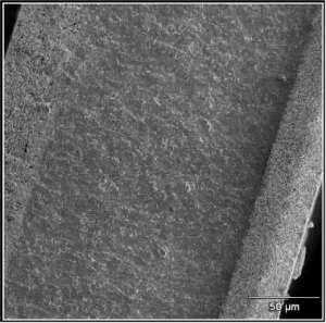 Cross section of solid oxide fuel cell showing anode, electrolyte and cathode